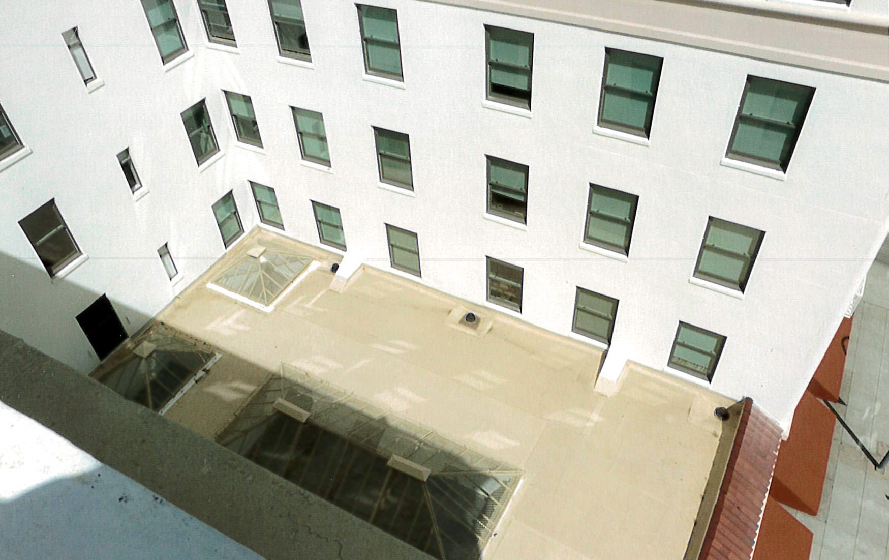 Light court skylight, repaired roof, relocated air conditioning units 